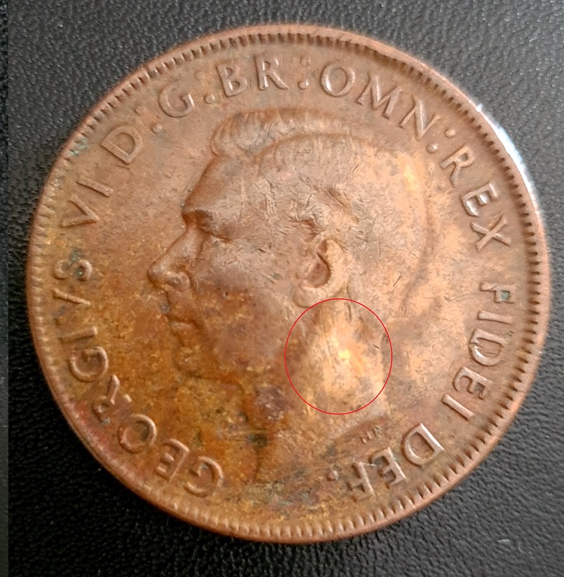 Australian-Penny-1950---Struck-Through-Foreign-Object